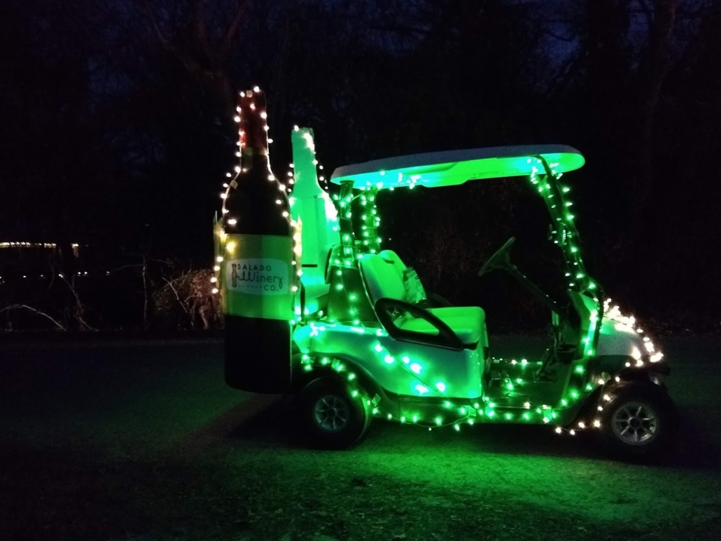 picture of golf cart lit up for parade